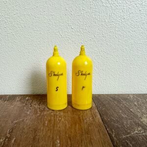 Vintage Yellow Skelgas Propane Advertising Salt & Pepper Shakers‎